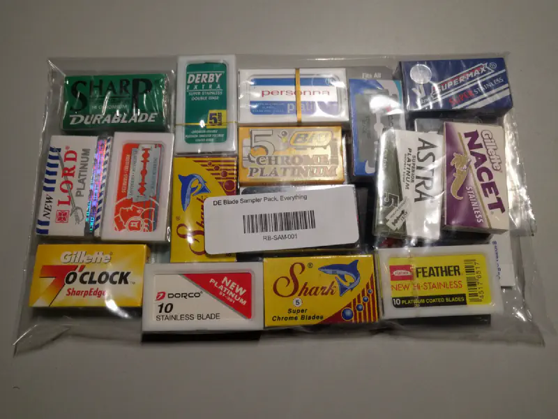 A bag of DE razor blade packs, all different brands.