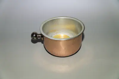 A copper shave bowl