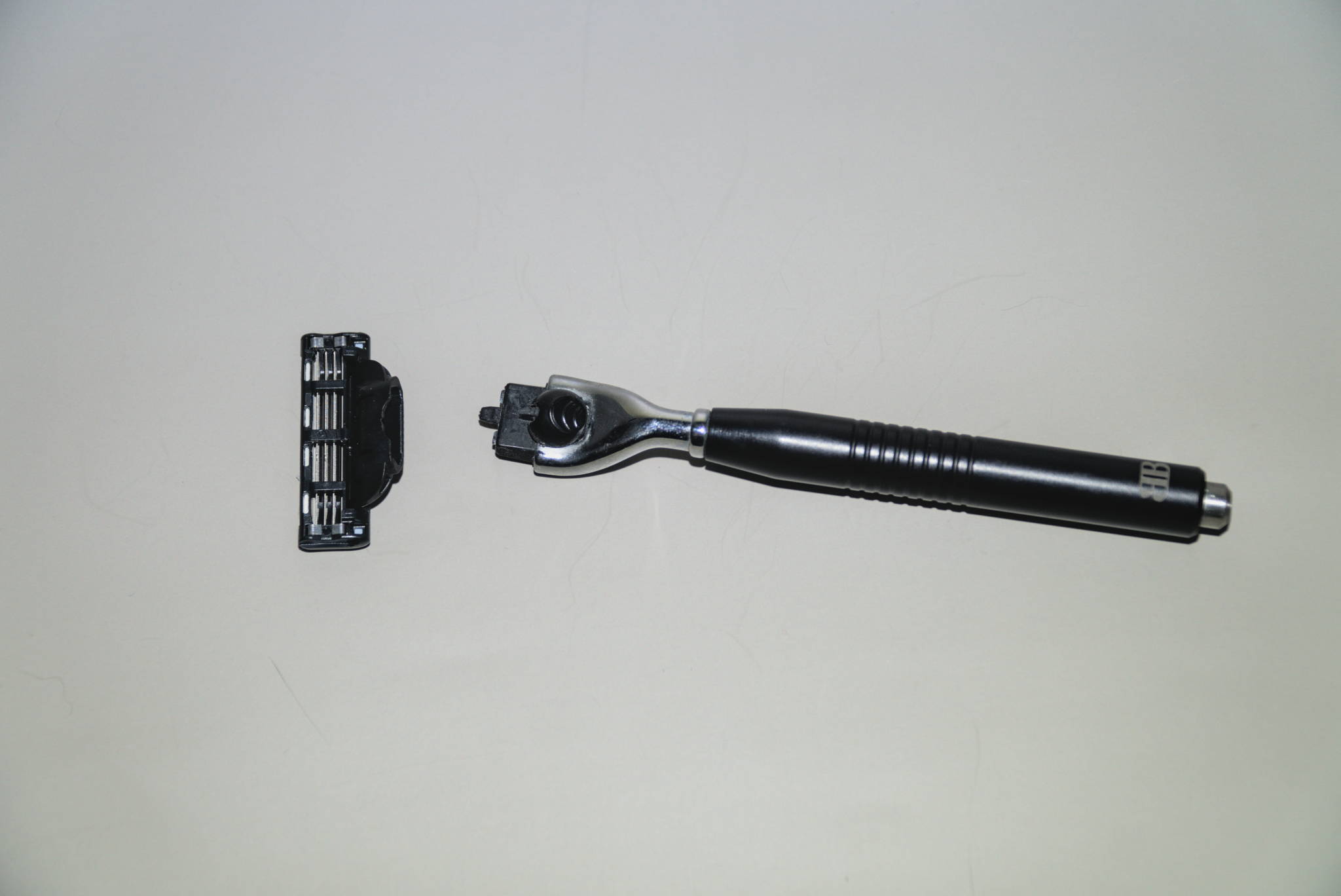 A custom Mach3 blade handle with blade detached