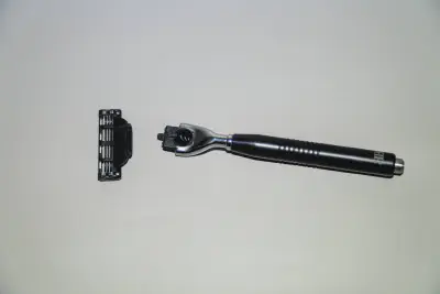 A custom Mach3 blade handle with blade detached