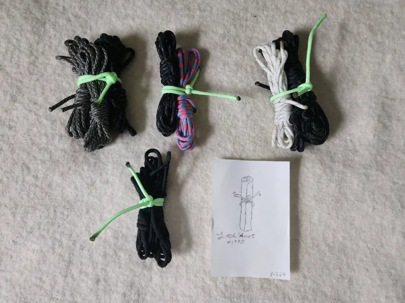 An example image showing the Lock Knot (#1990) tied around a number of groups of hanks
